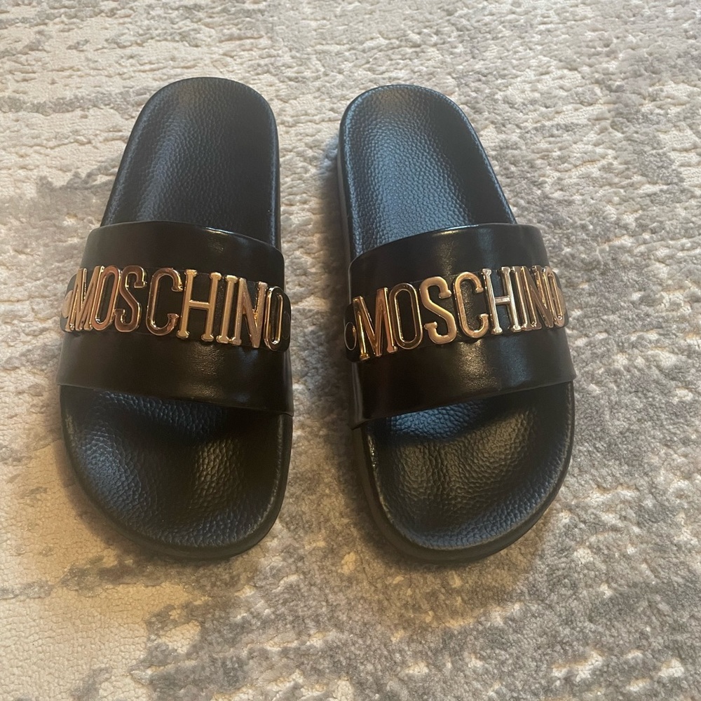 Black and gold pool slides
